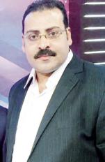 ماجد نادى رئيس النقابة العامة لبقالى التموين