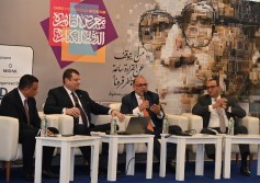 وكيل محافظ المركزي خلال مشاركته في ندوة الشمول المالي بمعرض الكتاب